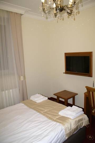 Фото номера Двухместный номер с 2 отдельными кроватями Отель Hotel President г. Коцк 2