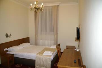 Фото номера Двухместный номер с 2 отдельными кроватями Отель Hotel President г. Коцк 4